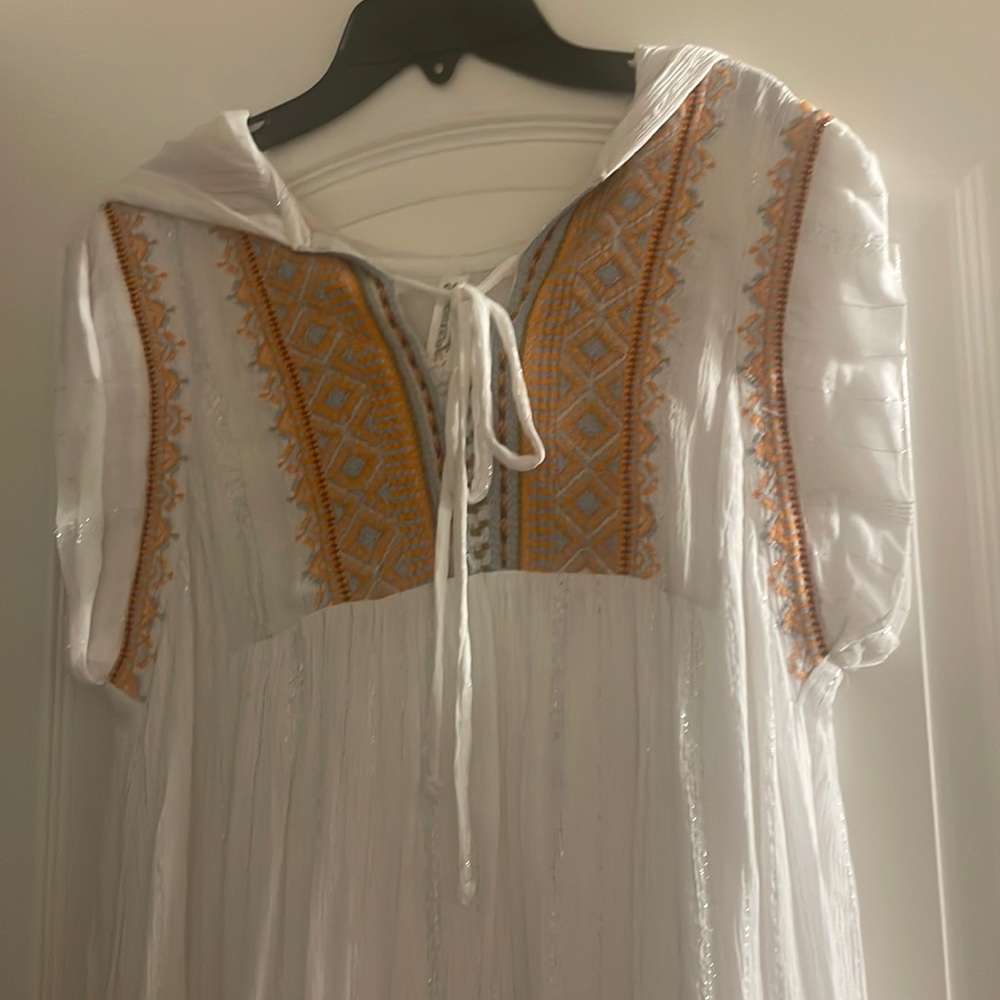 Beach cover up with hoodie in the back ever worn